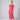 A woman modeling a short-sleeved, loose-fitting midi dress in a vibrant pink fabric against a neutral gray studio background.