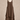 A sleeveless brown dress displayed on a mannequin stand against a textured beige studio backdrop.